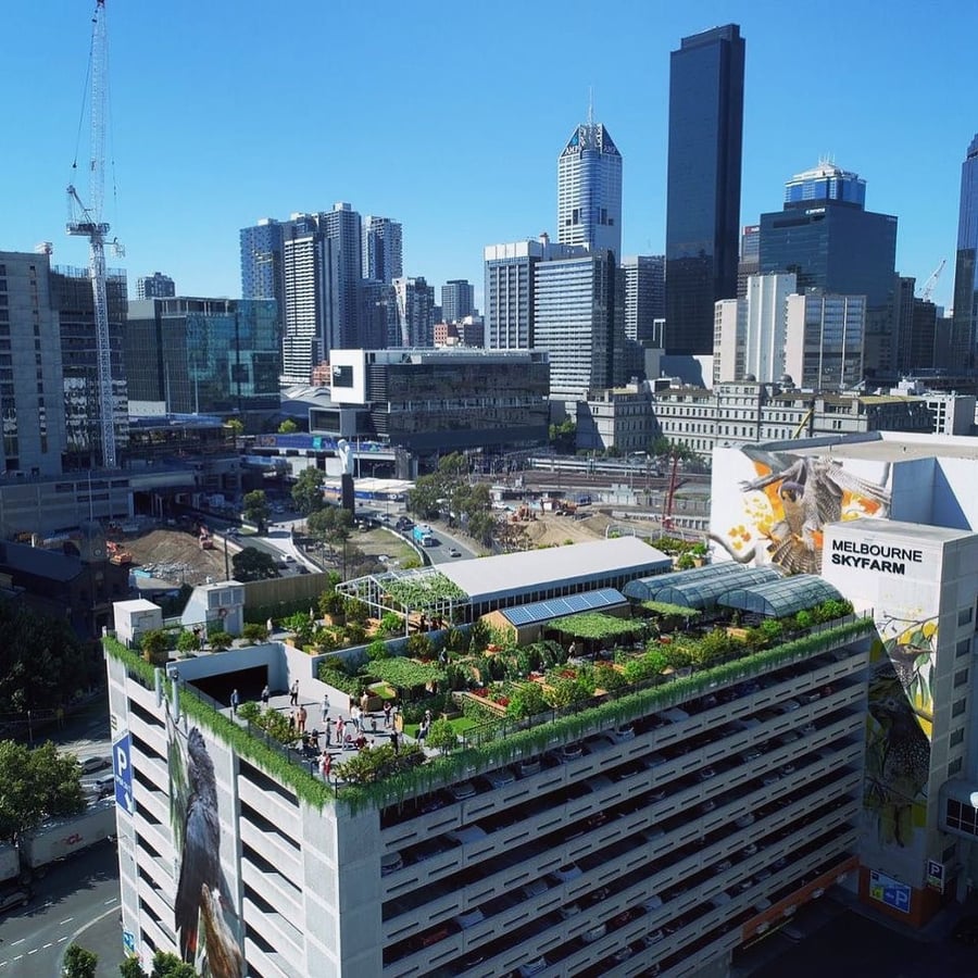 Architectural design integrating productive growing systems into a building