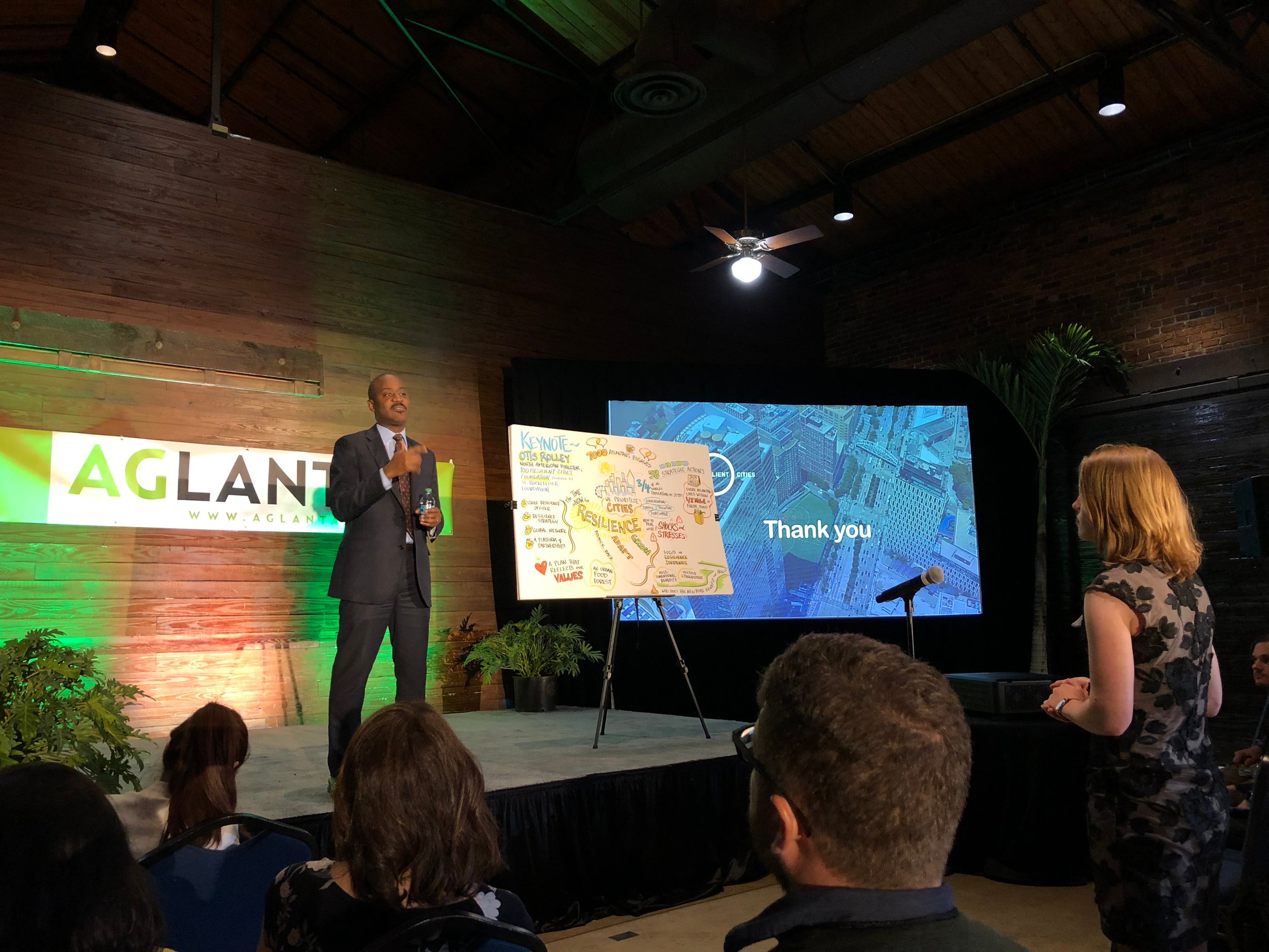 Day 1 Keynote speaker, Otis Rolley (left), answers questions following his talk about resilient cities.