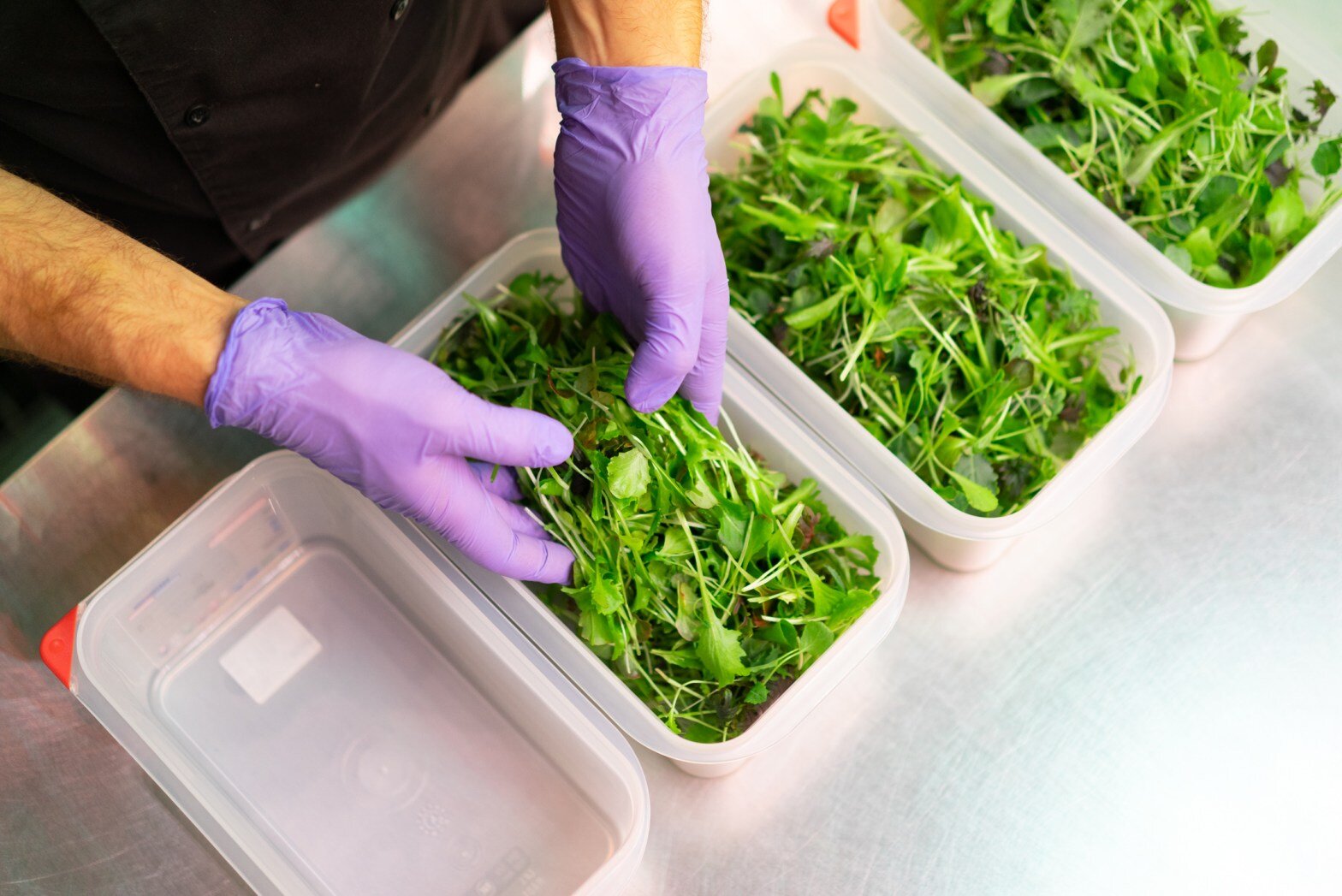 Greens are now being sold in reusable containers. Photo: Farm.One.