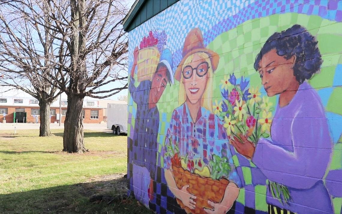 A mural at Graham Park is across the street from where the Rochester Farmers Market will be held inside buildings 31 and 35 from November to April. (Noah Fish / Agweek)