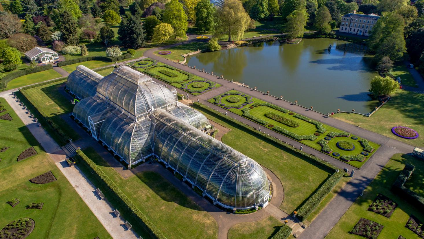 The Palm House at Kew Royal Botanic Gardens in England, originally constructed in 1844 as a home for exotic plant varieties brought back from abroad. | Source: itinari