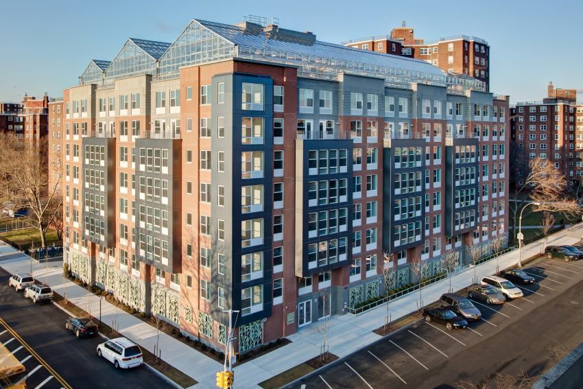 Rooftop urban farm integrated into a mixed-use development